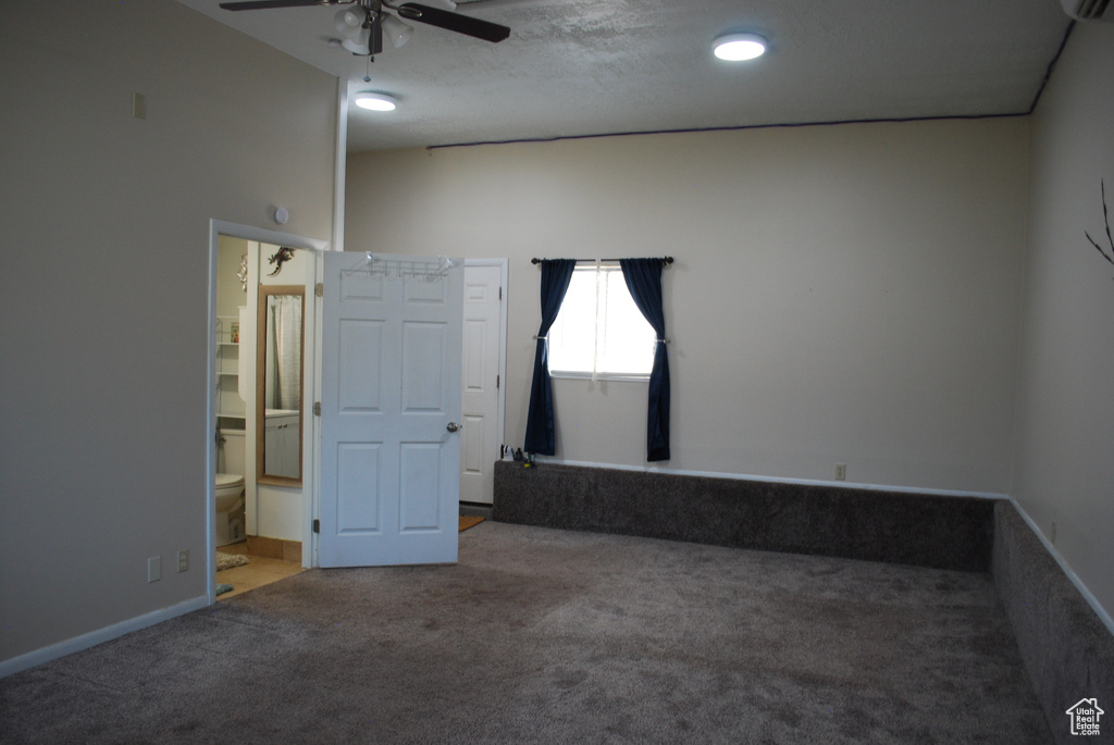Spare room with carpet and ceiling fan