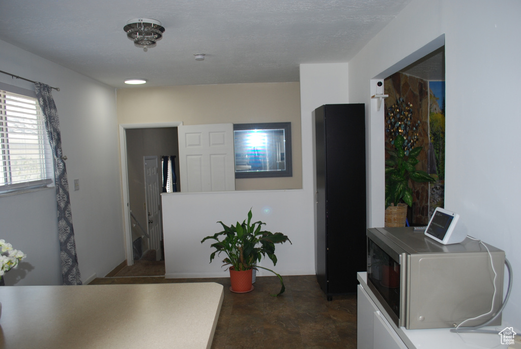 Entrance foyer with finished concrete flooring