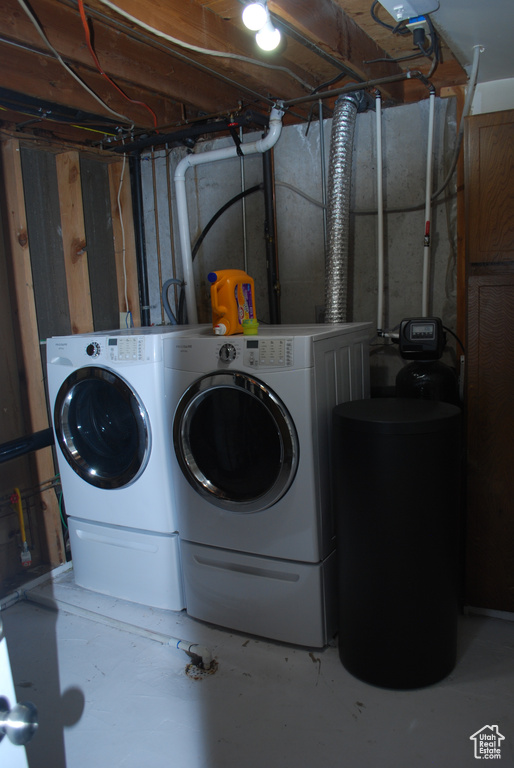 Laundry room featuring washing machine and clothes dryer
