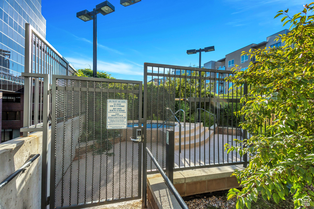 Gate featuring a pool