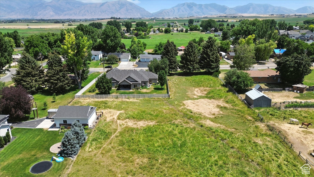 View from above of property with a mountainous background