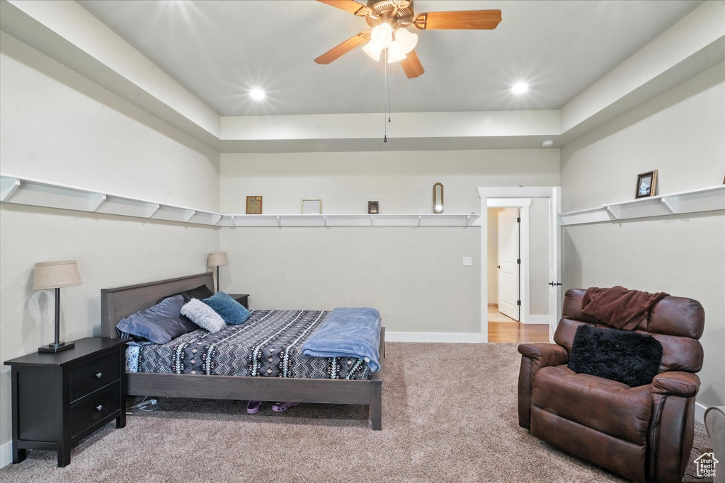 Bedroom with carpet floors, a ceiling fan, and recessed lighting