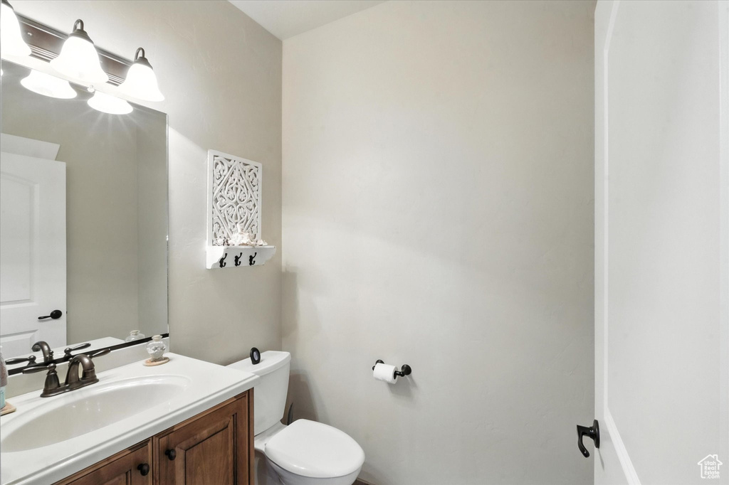 Bathroom featuring toilet and vanity