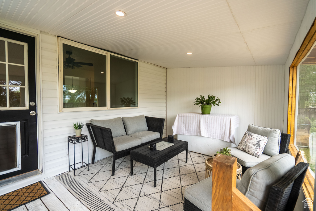 Sunroom with an outdoor hangout area