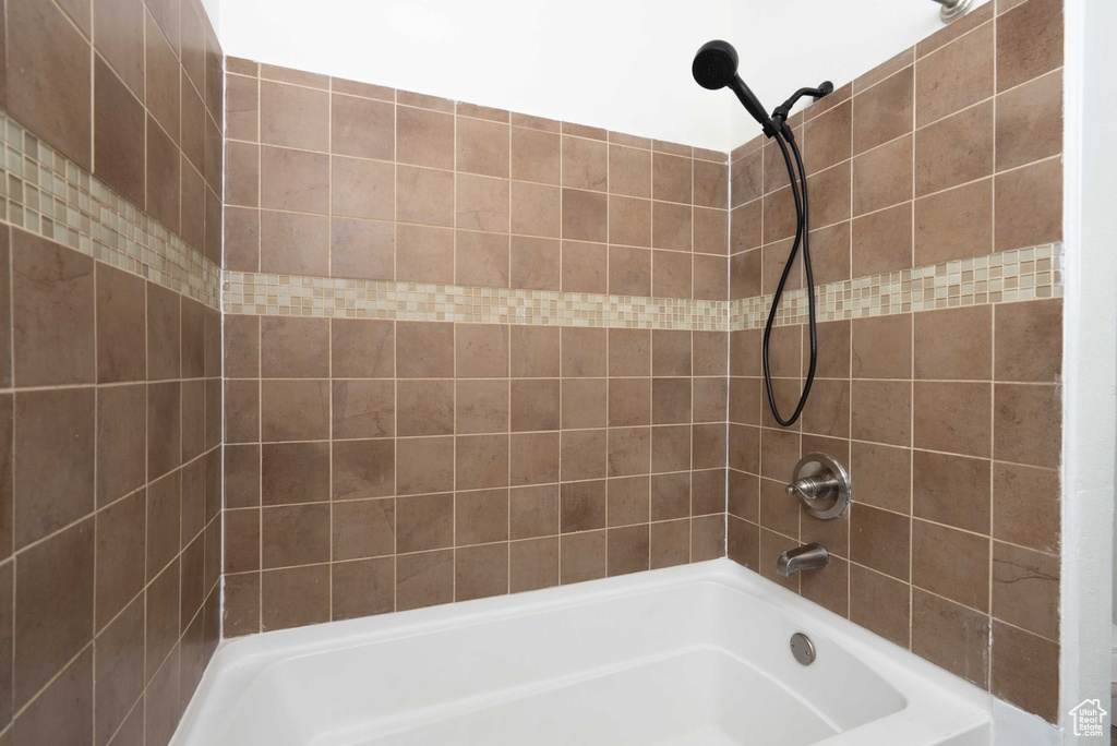 Full bathroom with washtub / shower combination