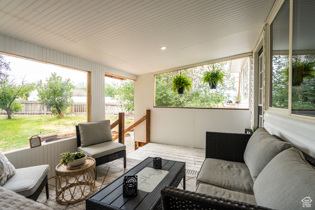 Sunroom with an outdoor living space