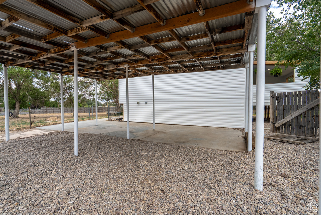 View of outbuilding featuring a carport