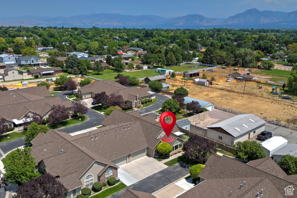 Aerial perspective of suburban area featuring mountains