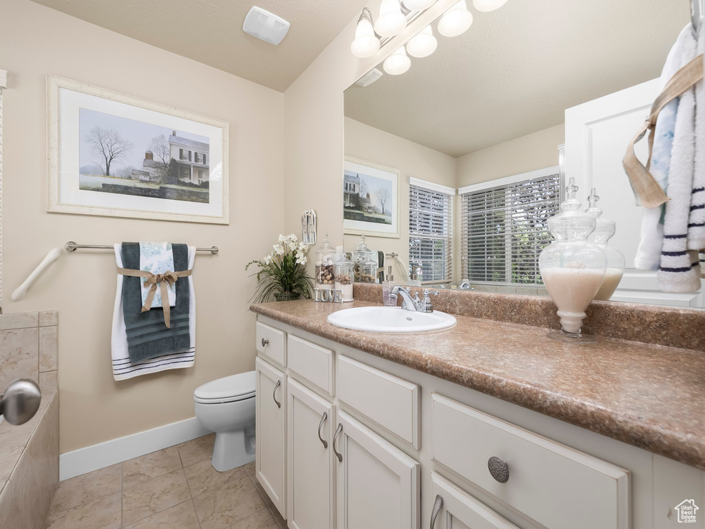 Bathroom with vanity and toilet