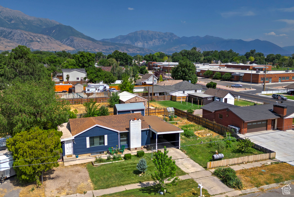 Aerial view of residential area featuring mountains