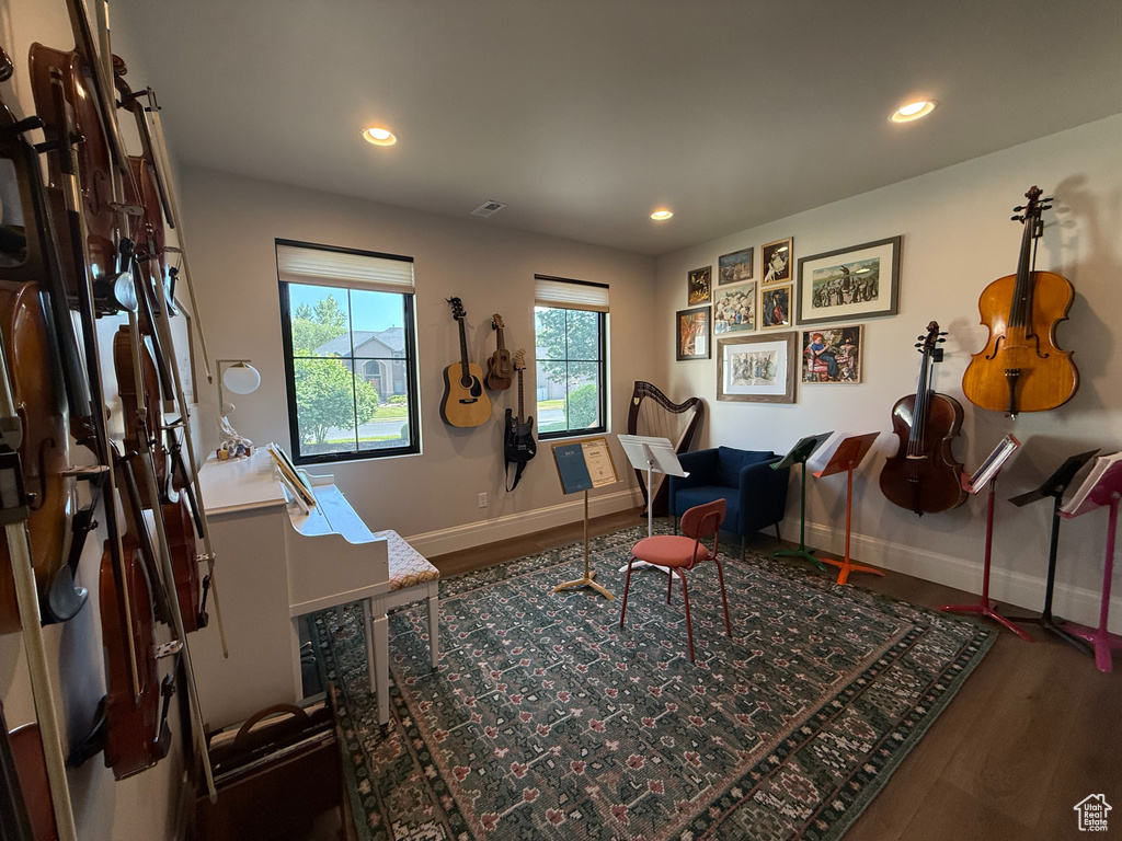 Sitting room featuring wood finished floors and recessed lighting