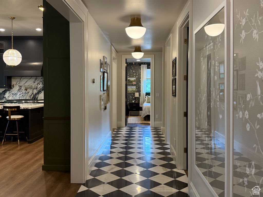 Hall with tile patterned floors