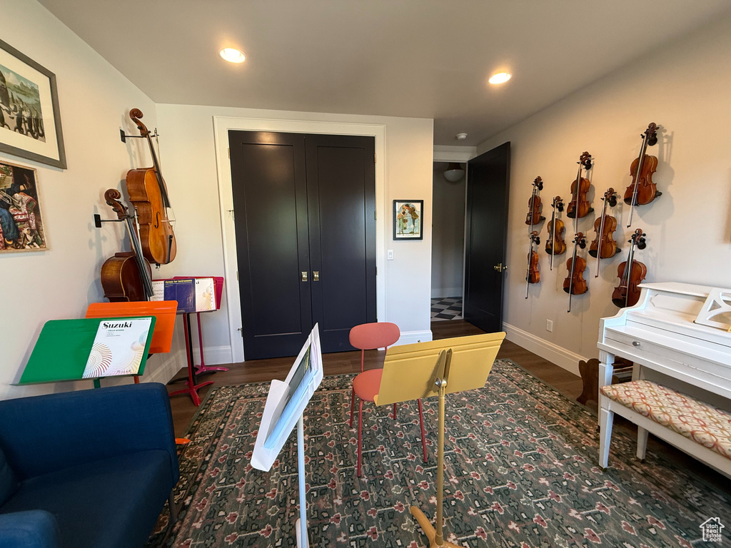 Living room featuring wood finished floors and recessed lighting