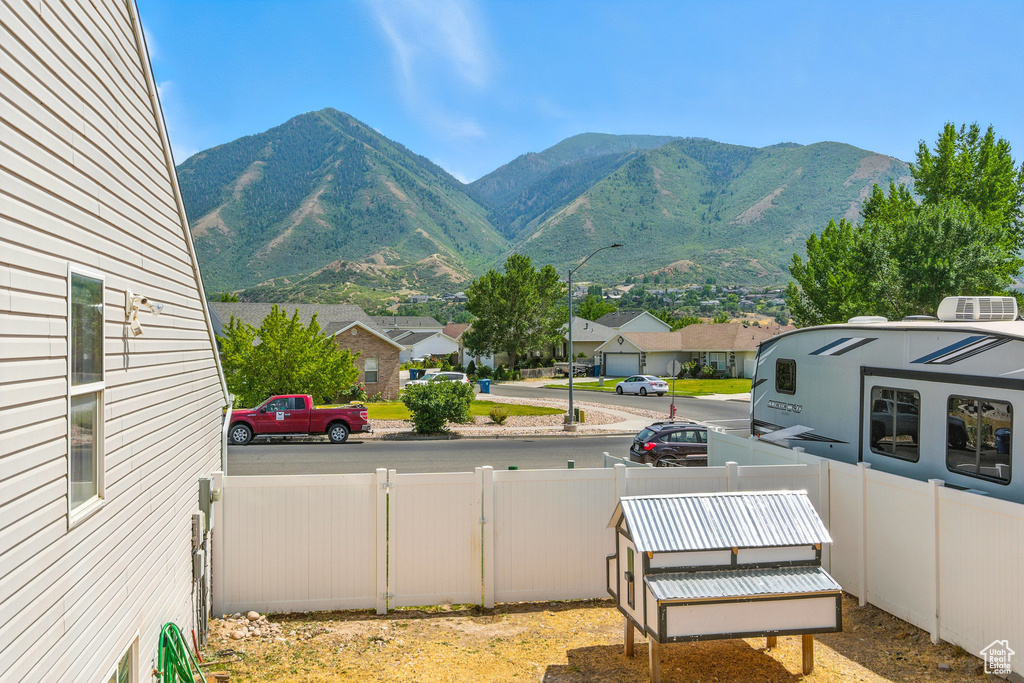View of mountain backdrop with nearby suburban area