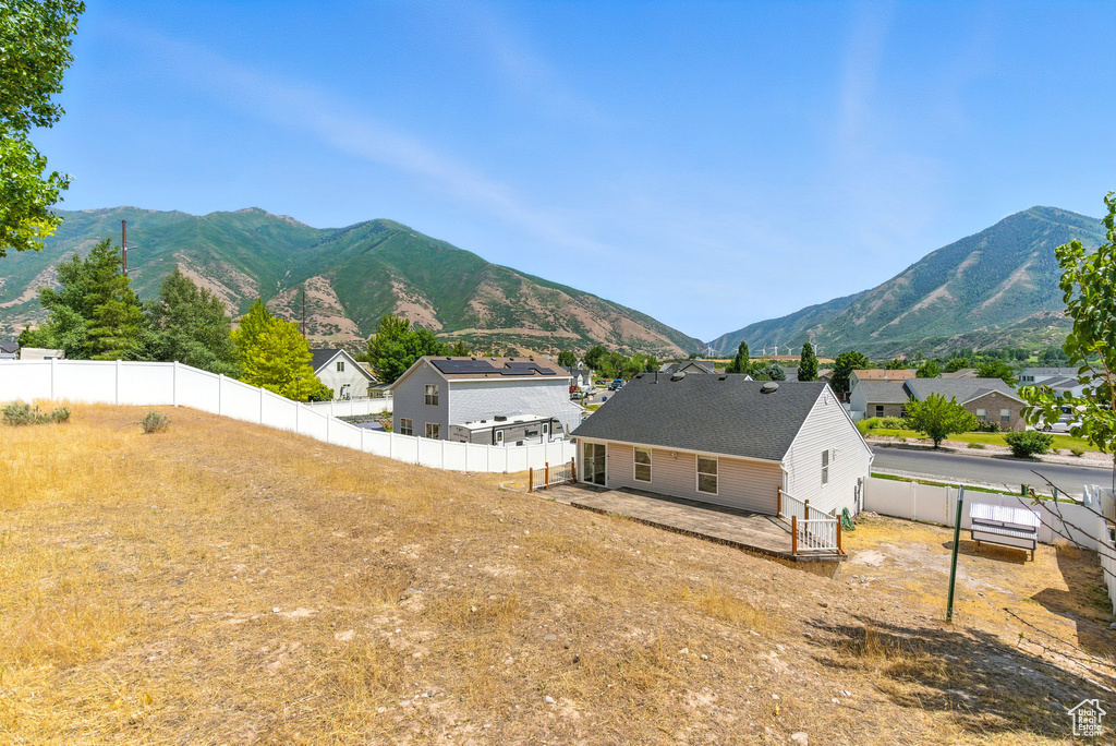 Mountain view featuring nearby suburban area