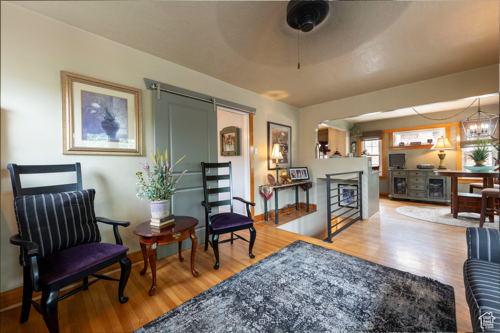 Sitting room featuring wood finished floors