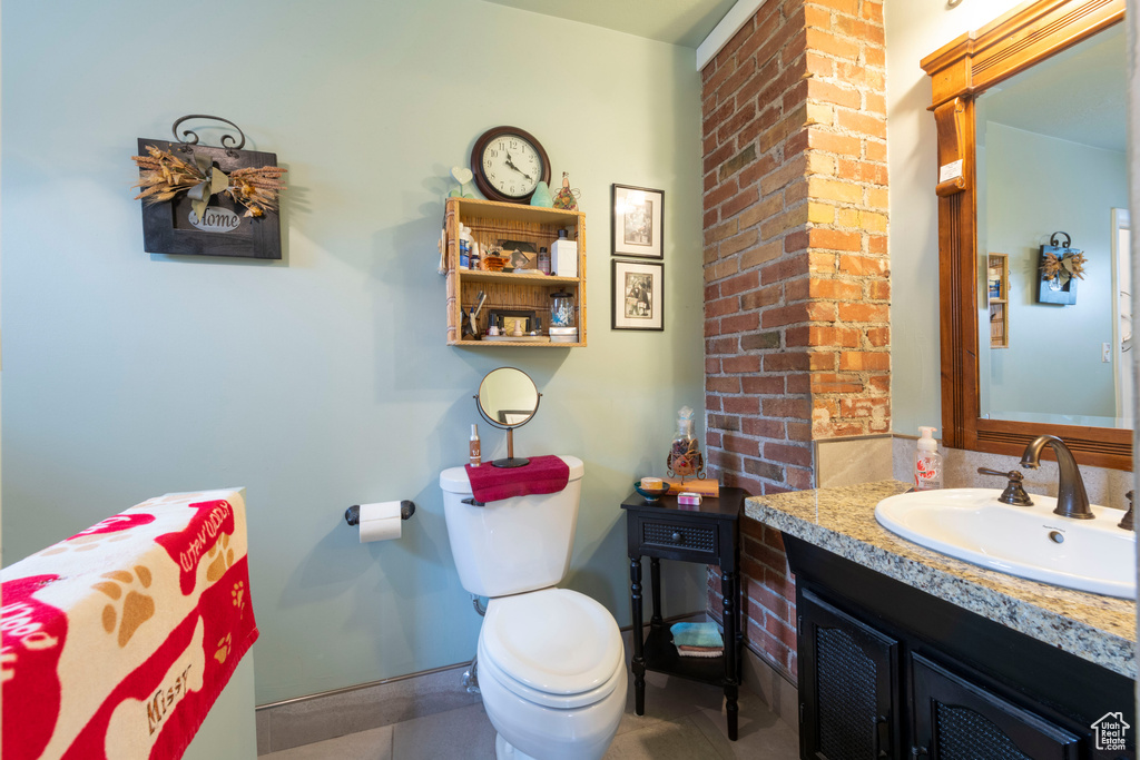 Bathroom with vanity and toilet