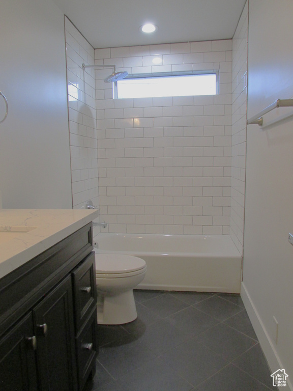 Full bathroom with vanity, shower / washtub combination, tile patterned flooring, and recessed lighting