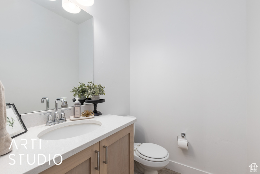 Bathroom with vanity and toilet