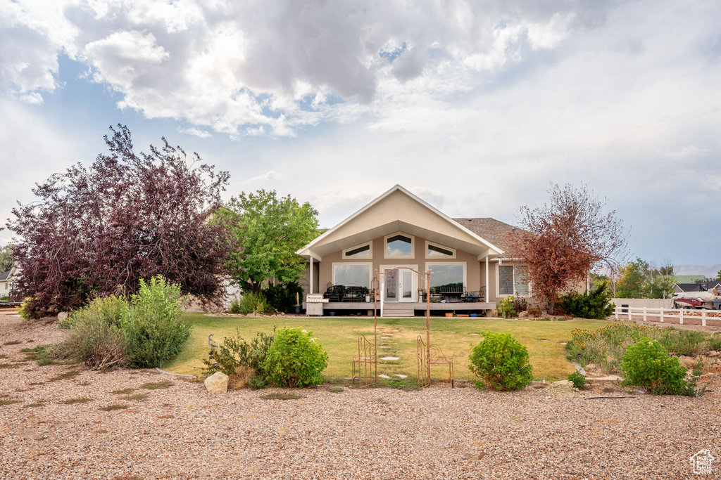Back of property featuring a deck