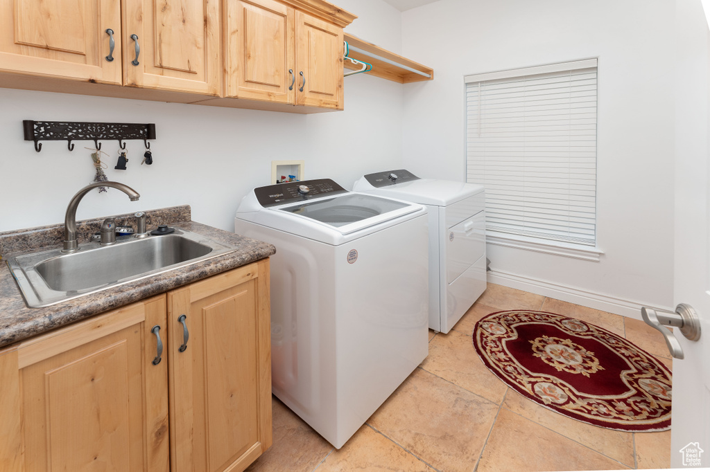 Laundry area with washer and dryer and cabinet space
