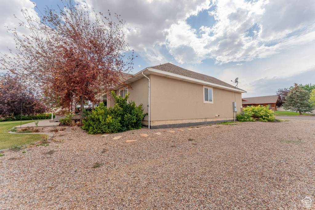 View of home\'s exterior with stucco siding
