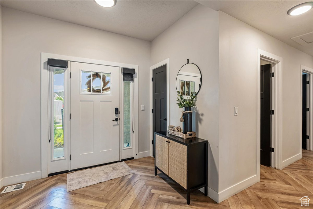 Foyer with baseboards