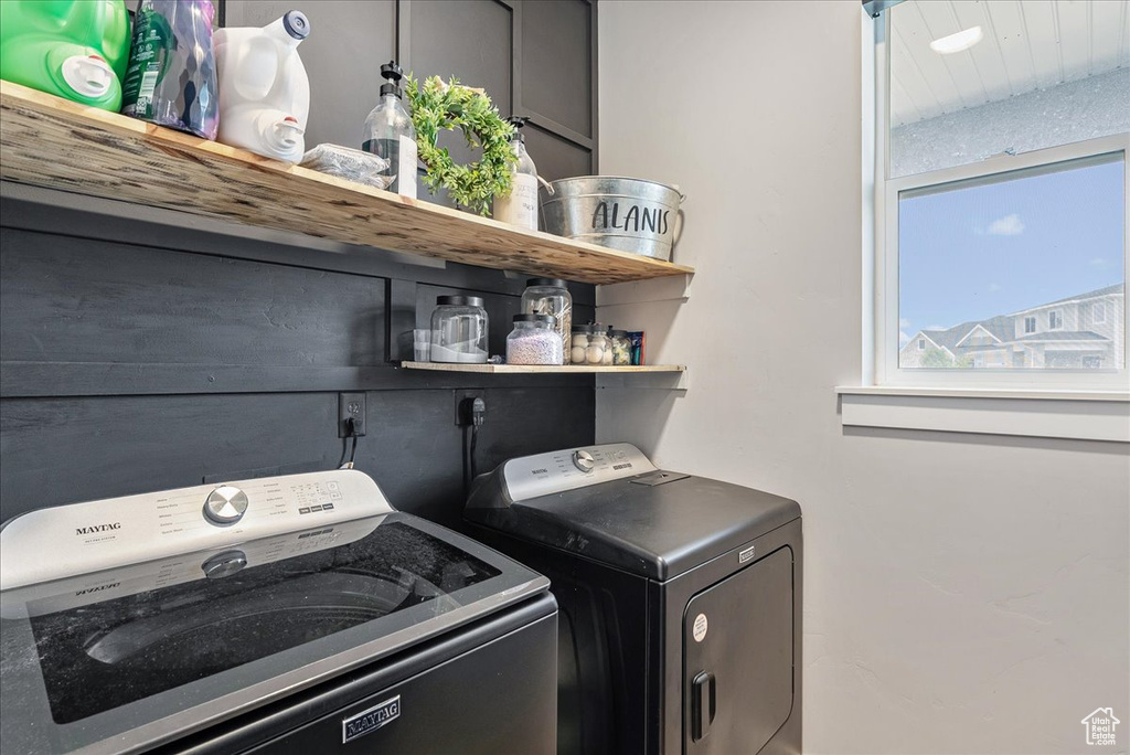 Laundry area featuring washer and clothes dryer
