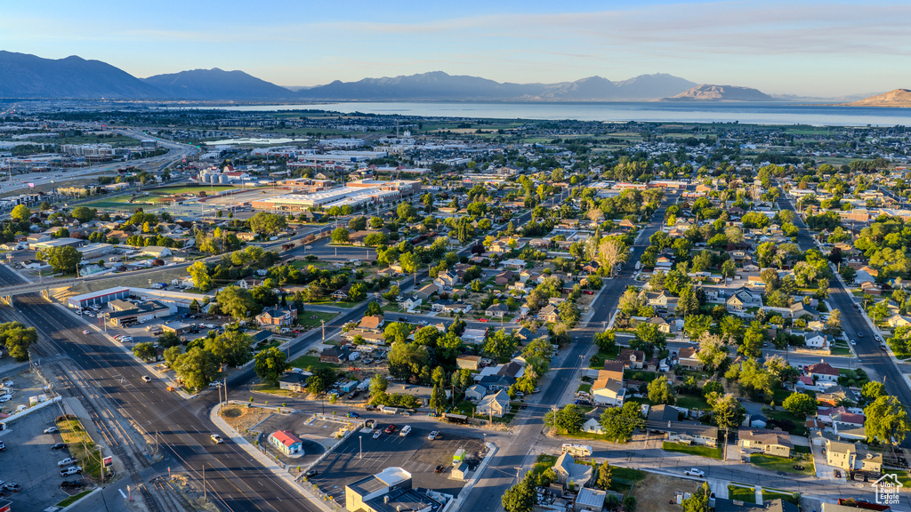 Aerial overview of property\'s location with a mountainous background