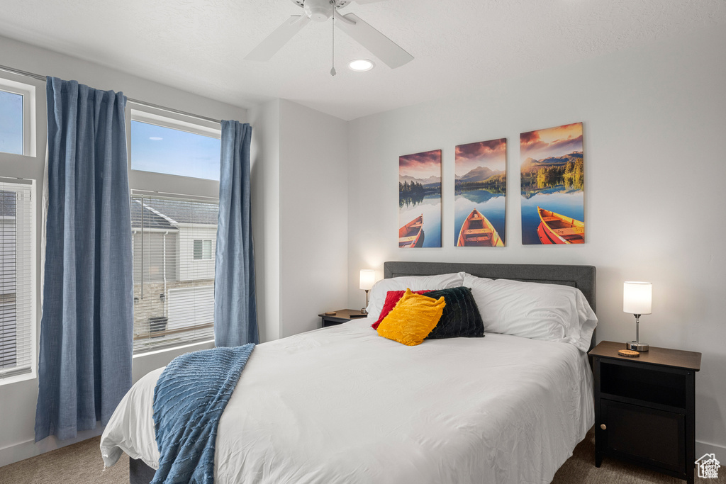 Bedroom featuring carpet floors, a ceiling fan, and recessed lighting