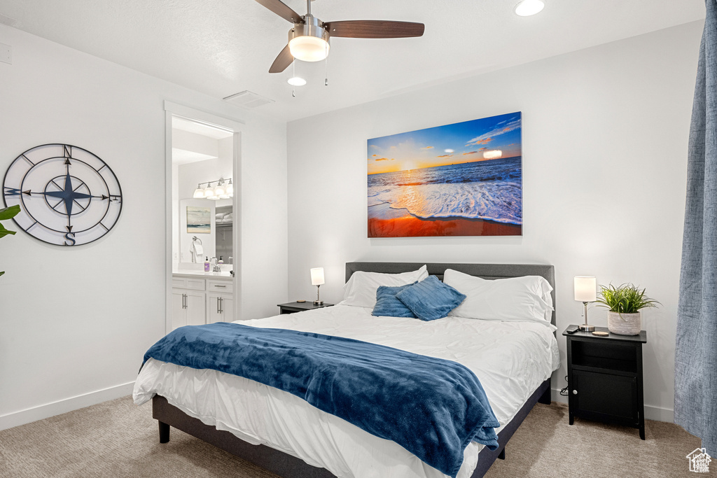 Bedroom featuring carpet flooring, recessed lighting, ensuite bathroom, and a ceiling fan