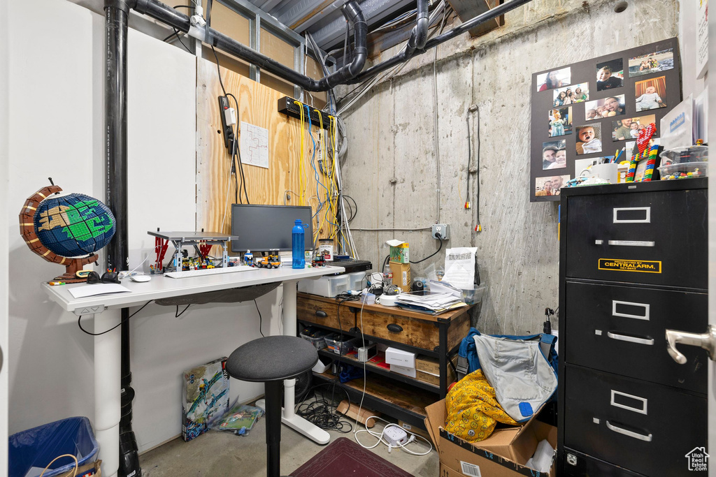 Home office with concrete floors