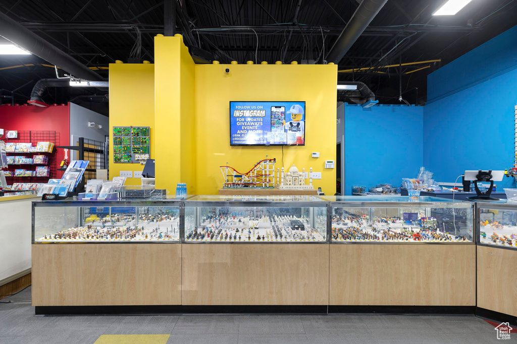 Bar area with light brown cabinetry
