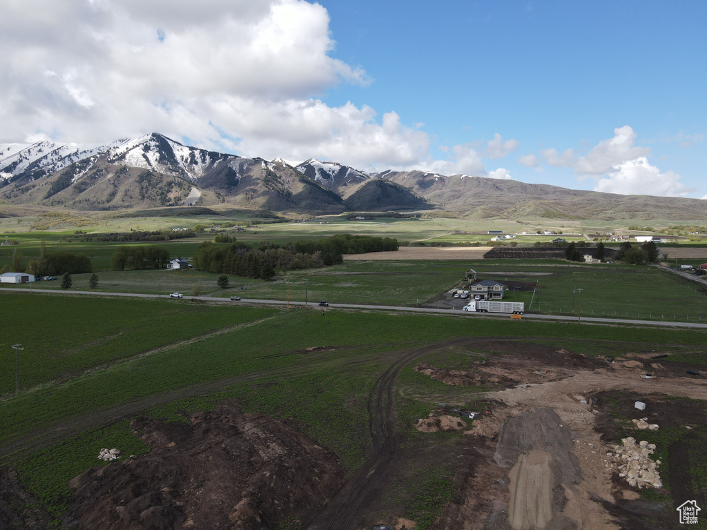View of mountain background featuring rural landscape and large plots for crops