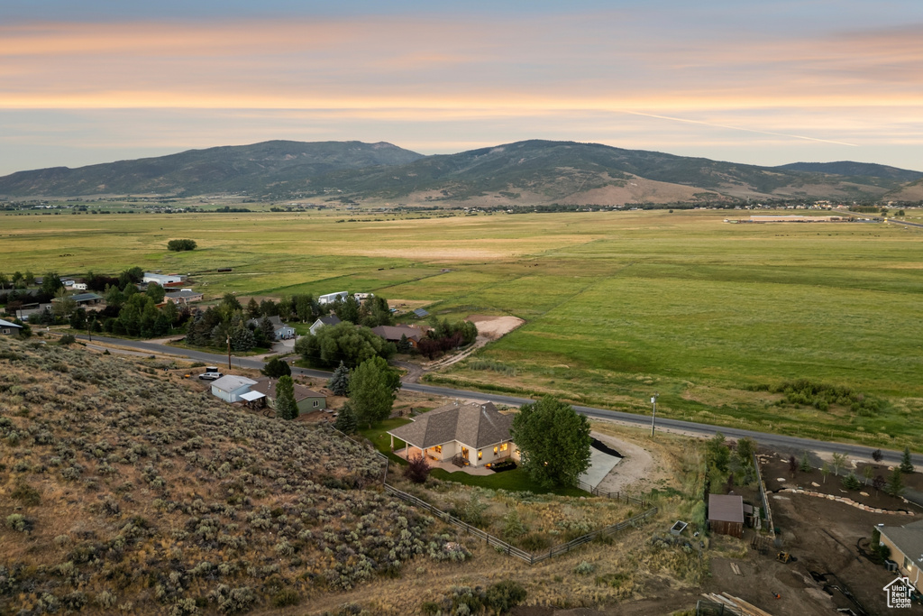View of mountain backdrop featuring rural landscape