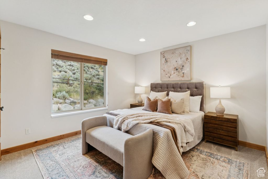 Bedroom featuring recessed lighting and light carpet
