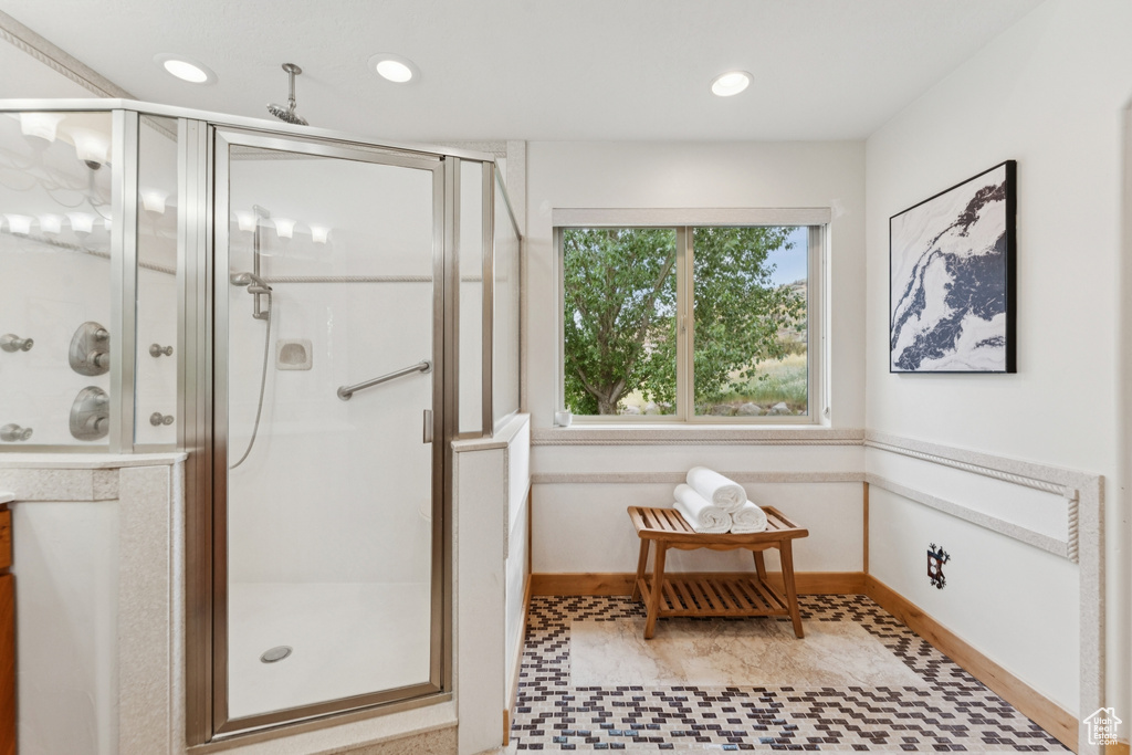 Bathroom featuring a shower stall, recessed lighting, and tile patterned floors
