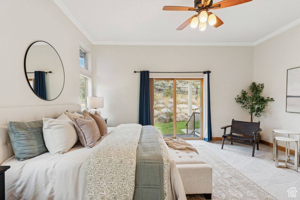 Carpeted bedroom featuring crown molding, access to exterior, and ceiling fan