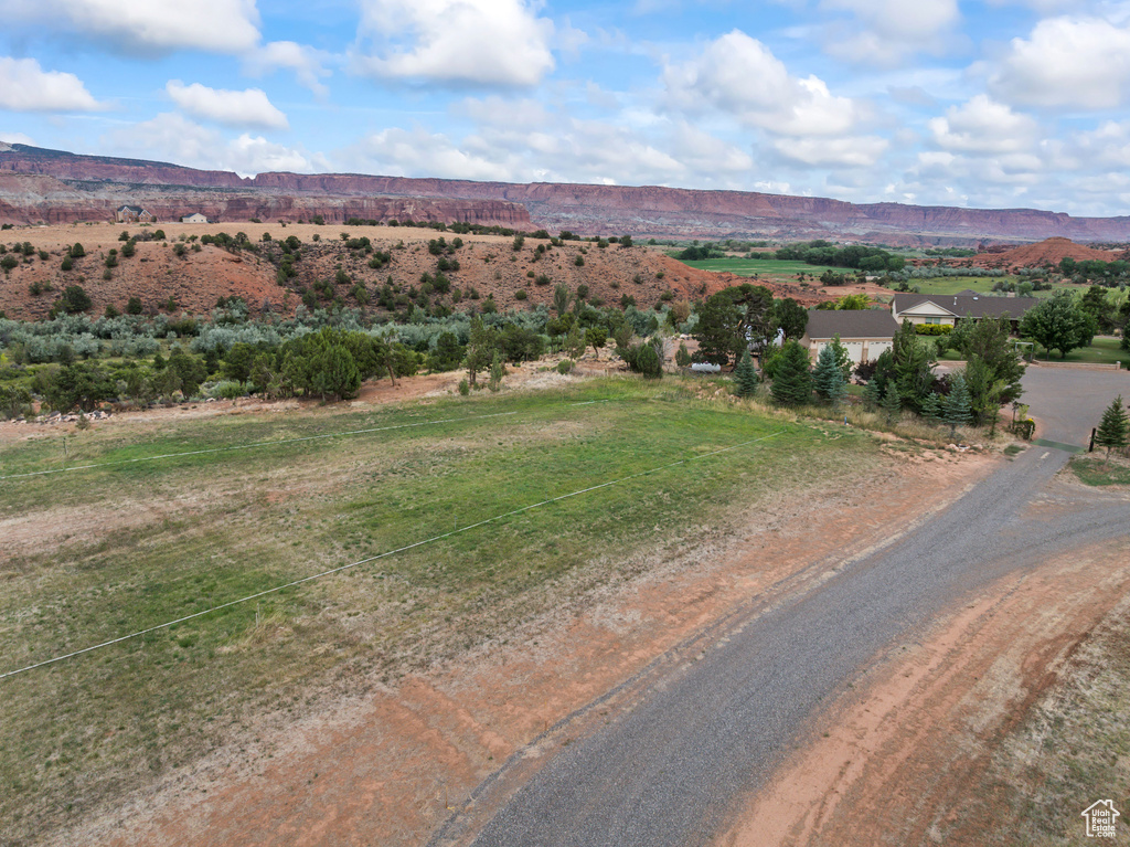 View of mountain backdrop with rural landscape