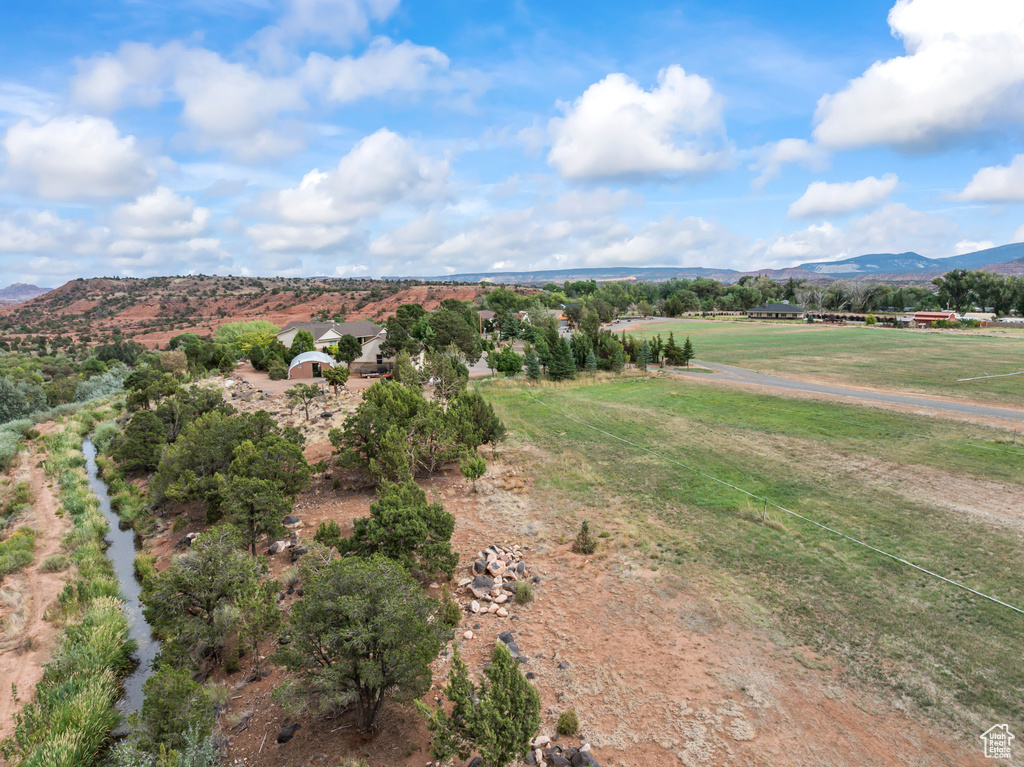 Overview of rural landscape with a mountainous background
