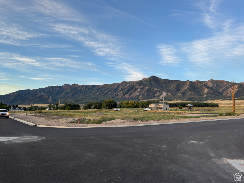 View of mountain backdrop featuring rural landscape
