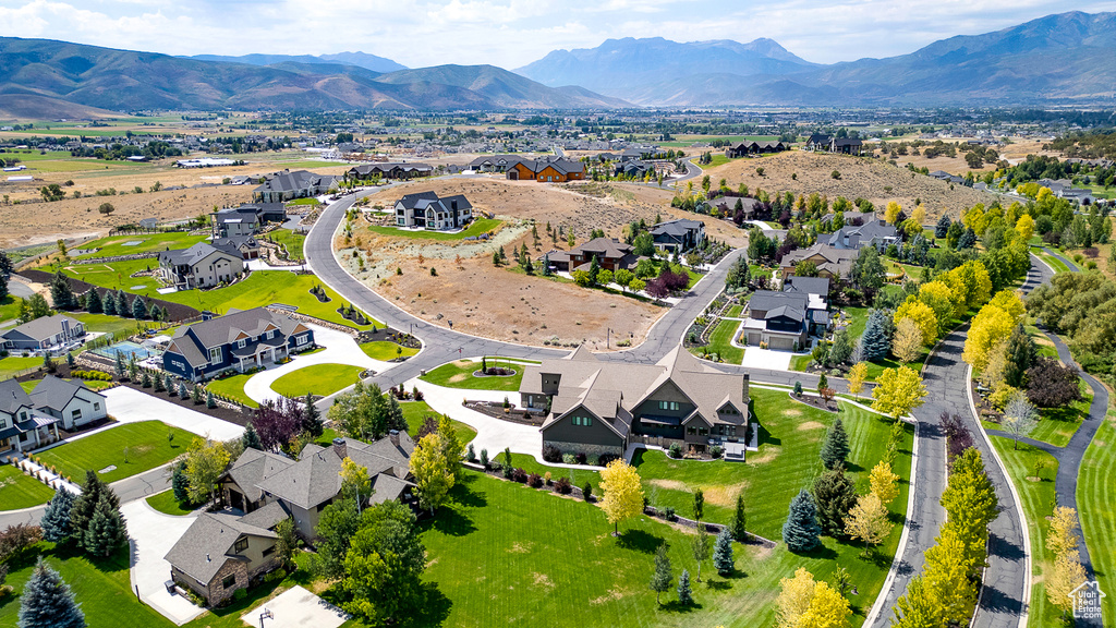 Aerial view of residential area with a mountain backdrop
