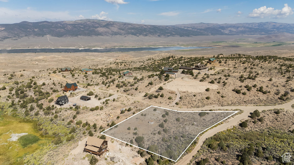 View of property location featuring property boundaries highlighted and a water and mountain view