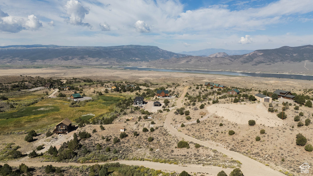 Mountain view featuring a large body of water