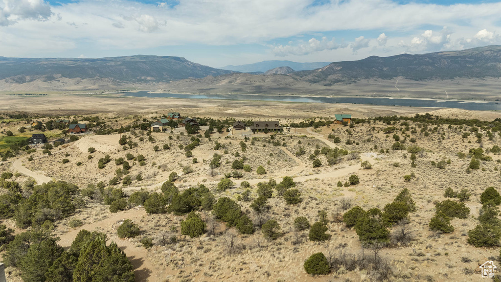 View of mountain backdrop featuring a large body of water