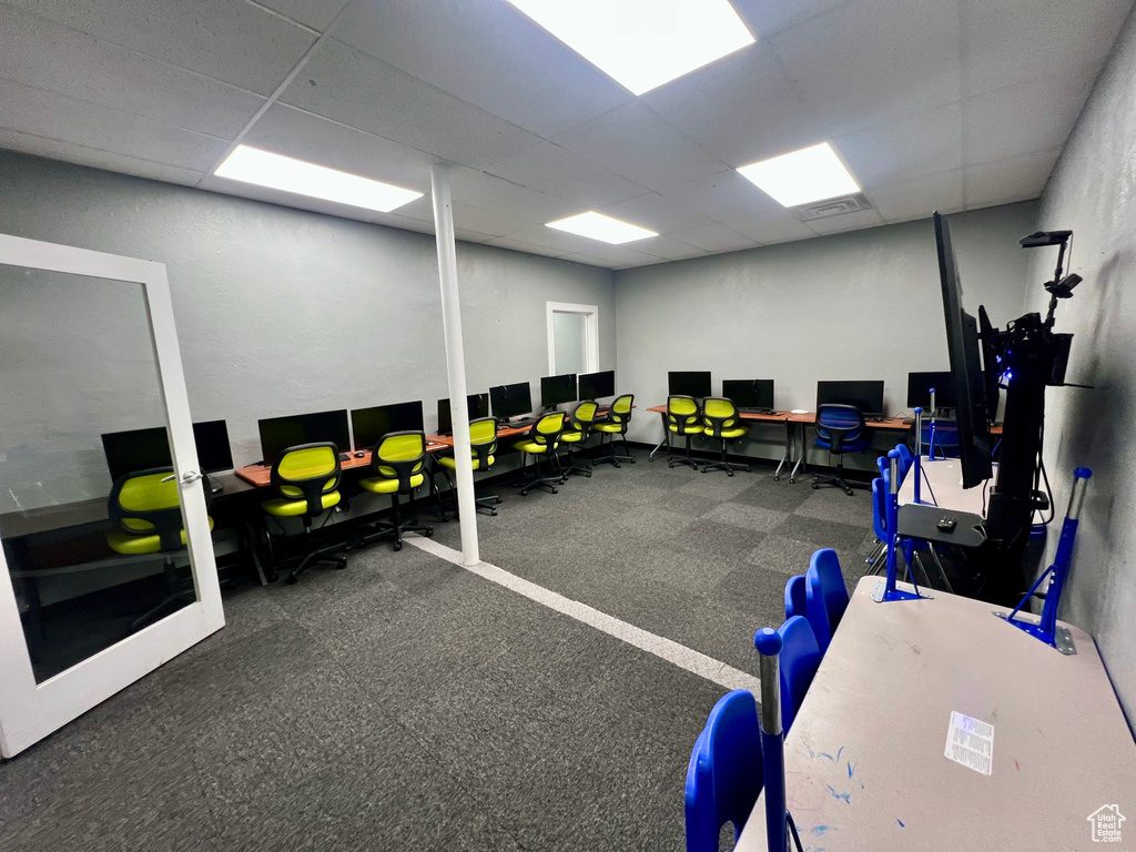 Workout room with a drop ceiling