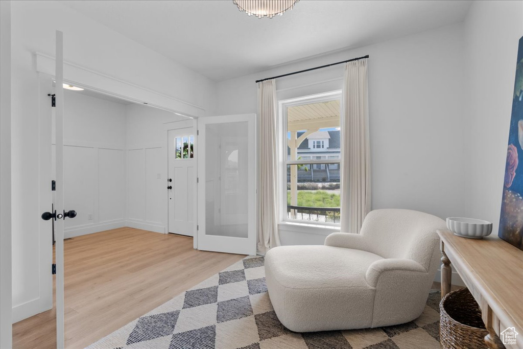 Sitting room featuring light wood finished floors