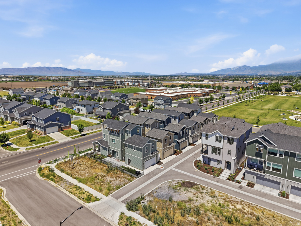 Modern residential development featuring multiple-story homes with varied exterior finishes