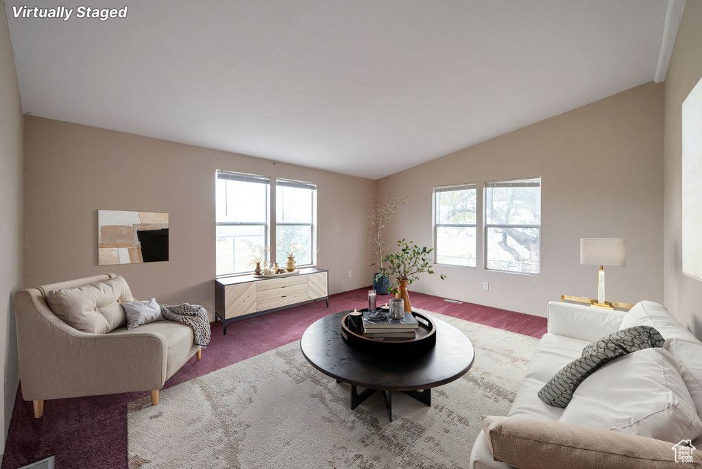 Living room with vaulted ceiling