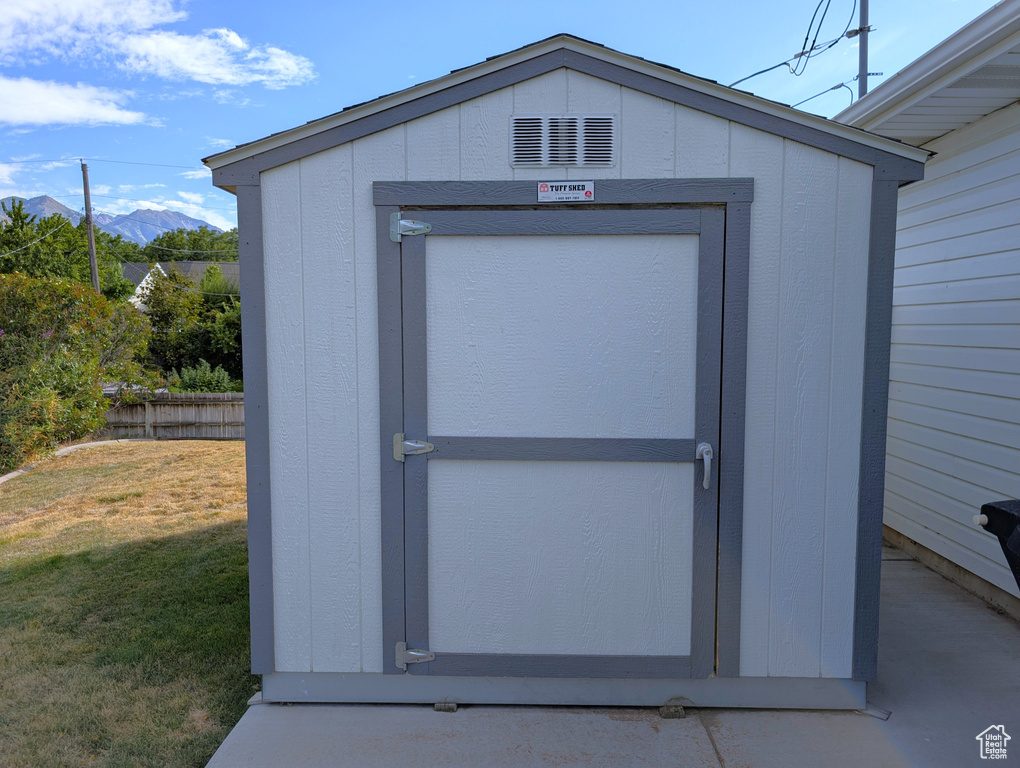 View of shed with a mountain view